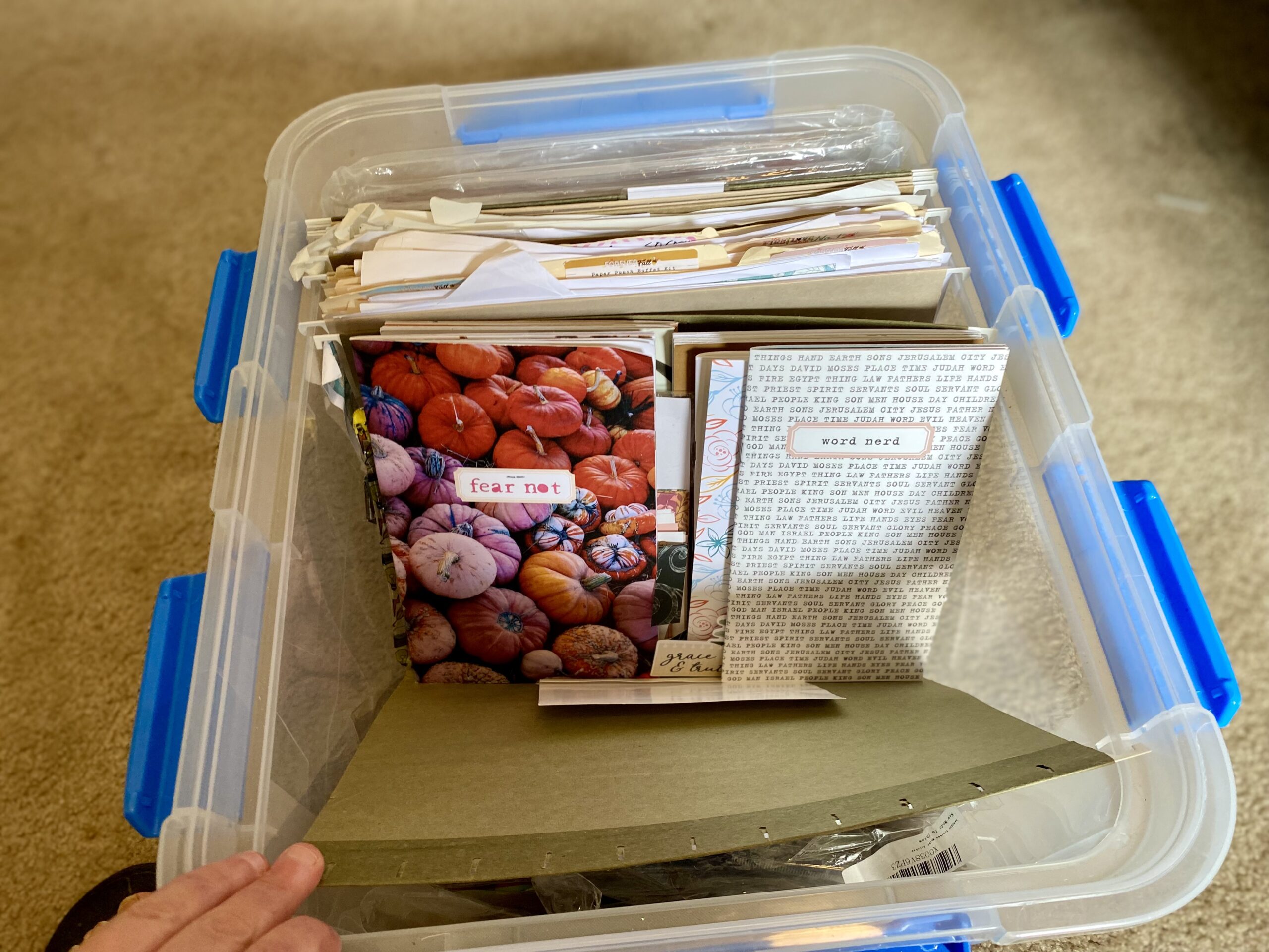 Pictures from seasonal craft supply bin showing different fall items like watercolors, stamps, patterned paper, journal cards, washi ect.