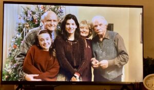 Family Gathered around Christmas tree in While you were sleeping movie