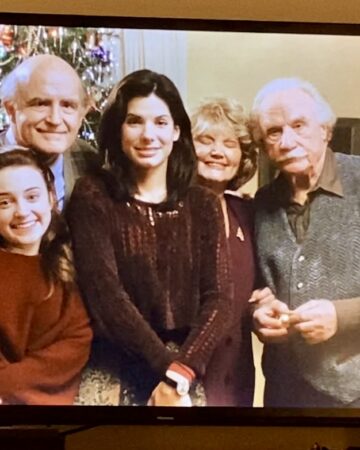 Family Gathered around Christmas tree in While you were sleeping movie